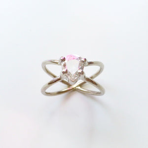 White gold engagement ring with rose cut, pear shaped diamond.