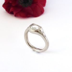 Half moon diamond engagement ring