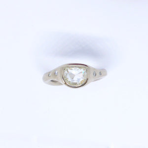 Moon diamond bezel set engagement ring