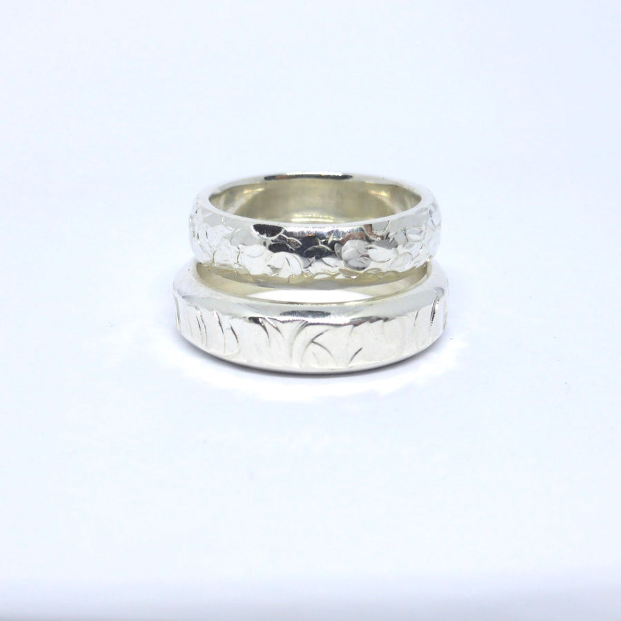 Sterling silver wedding bands with hammered textures 
